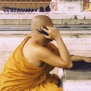Monk on a cell phone