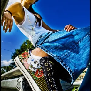 her Ed Hardy kicks...