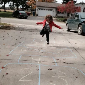 Amelia learning hopscotch