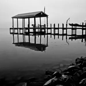 Boat house in the fog
