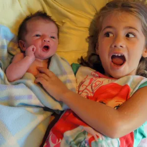 4 days old greets sister