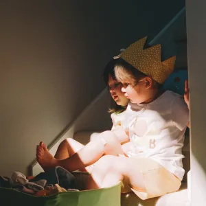 sisters sharing sunlight 