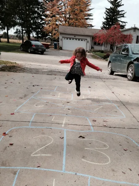 Amelia learning hopscotch
