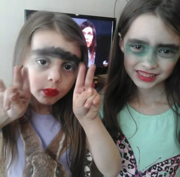 Girls putting on makeup