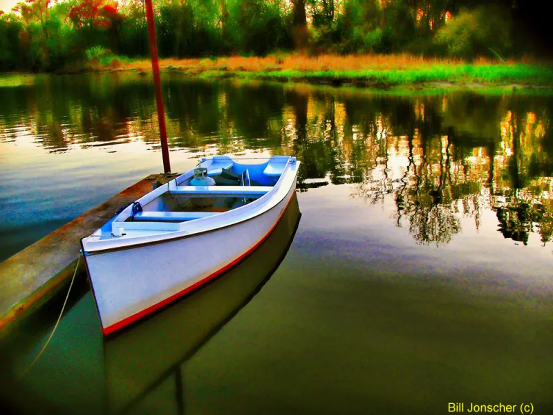 Boat at dock, sunset on the Potomac River